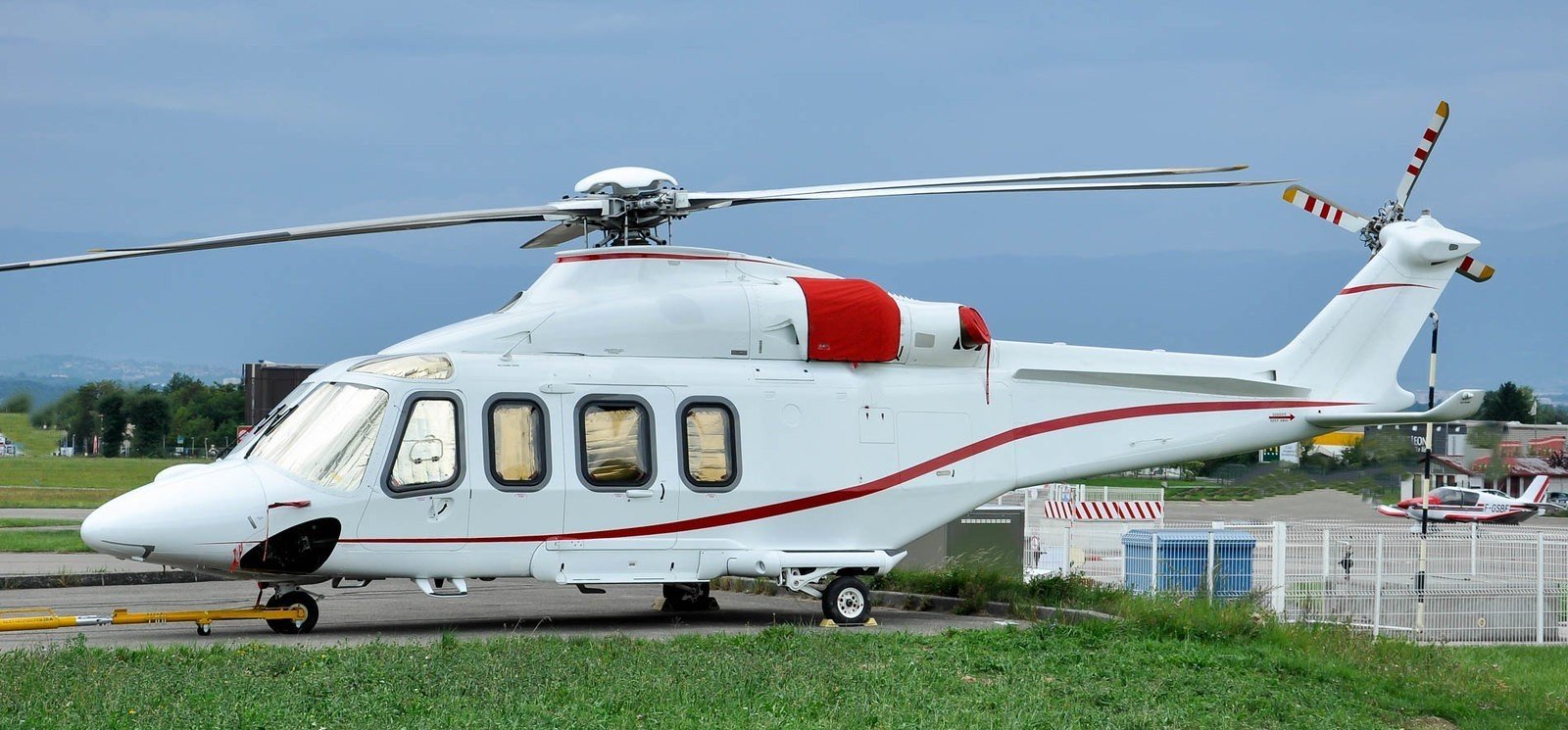 Leonardo AW139 helicopter parked, demonstrating its elegant and capable design.