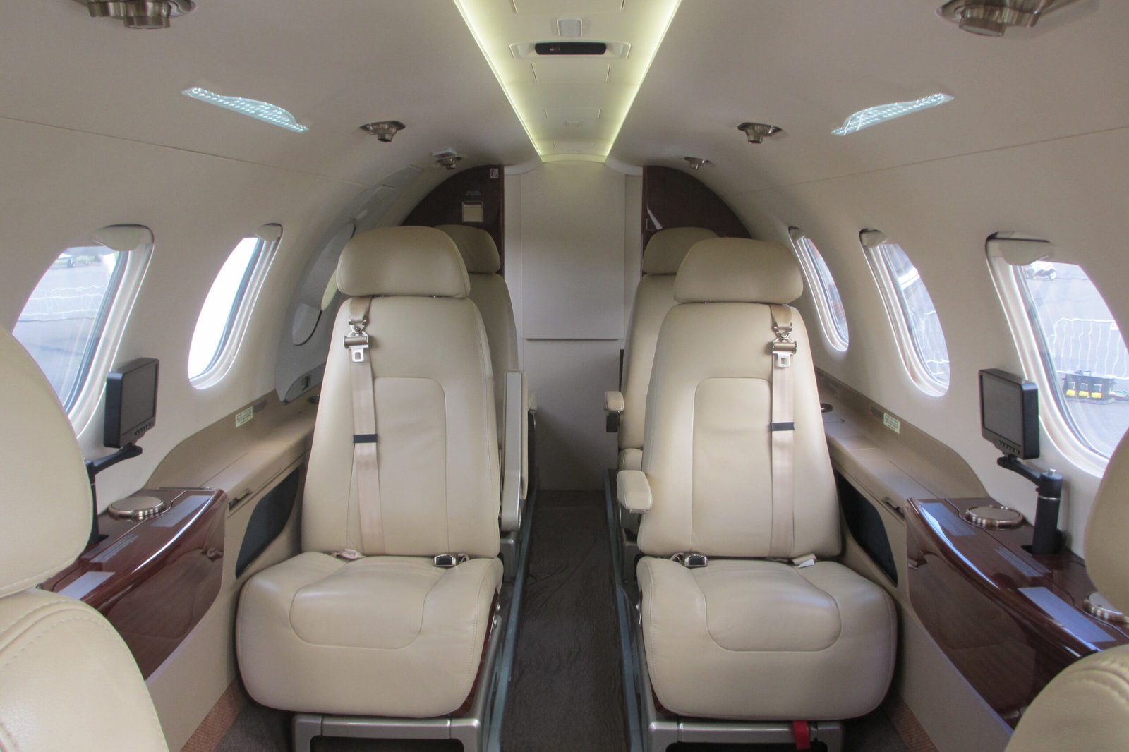 Luxurious Phenom 300 cabin interior with club seating