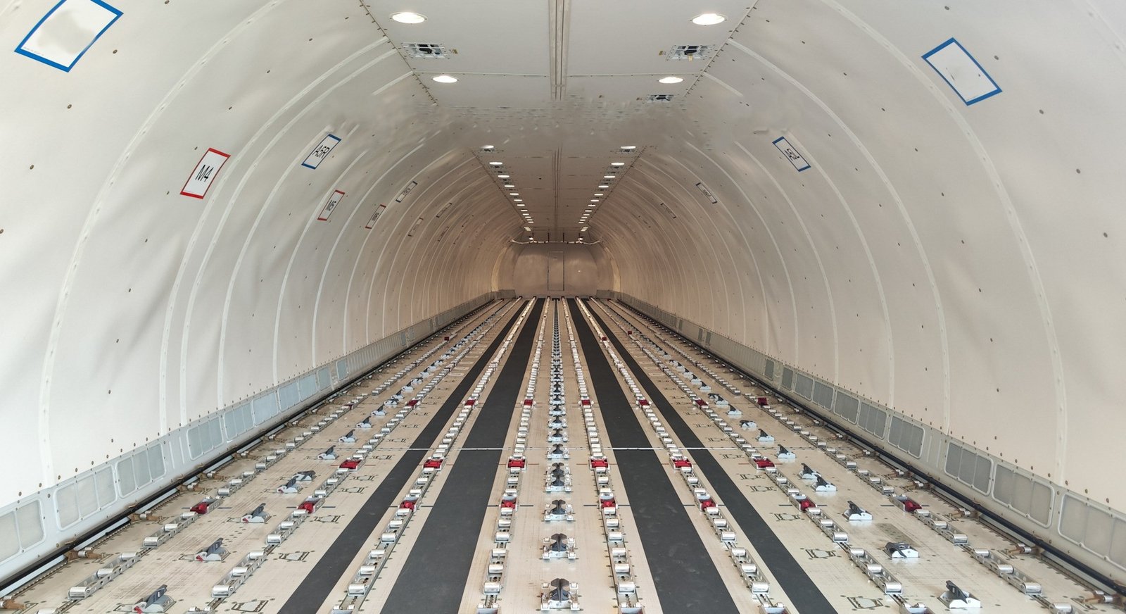 Interior main deck cargo hold of a Boeing 767-300ER BCF freighter aircraft, showing pallet positions