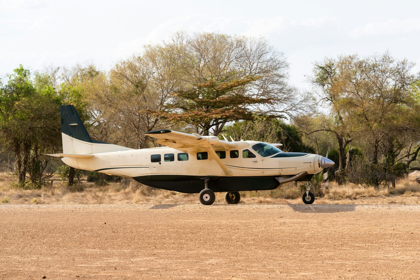 Cessna Grand Caravan parked on a dirt bush airstrip