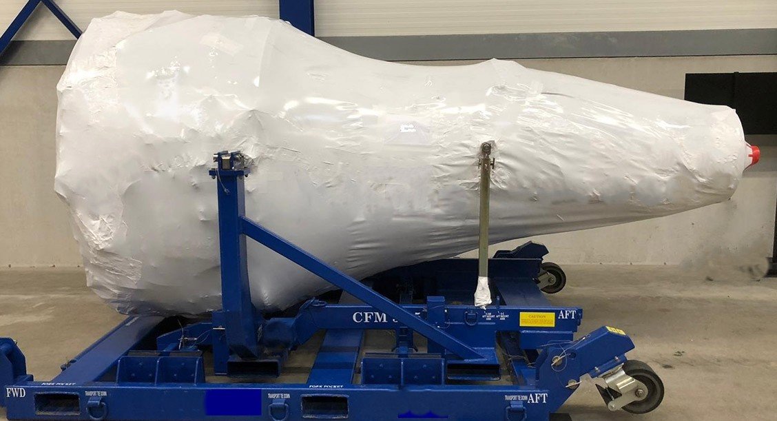 Stored aircraft engines in warehouse awaiting disposition