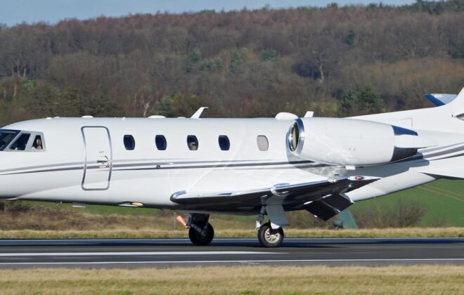 Cessna Citation XLS midsize business jet parked on a runway, showcasing its sleek design, spacious cabin windows, and Pratt & Whitney engines. Ideal for corporate travel, private charters, and special missions.