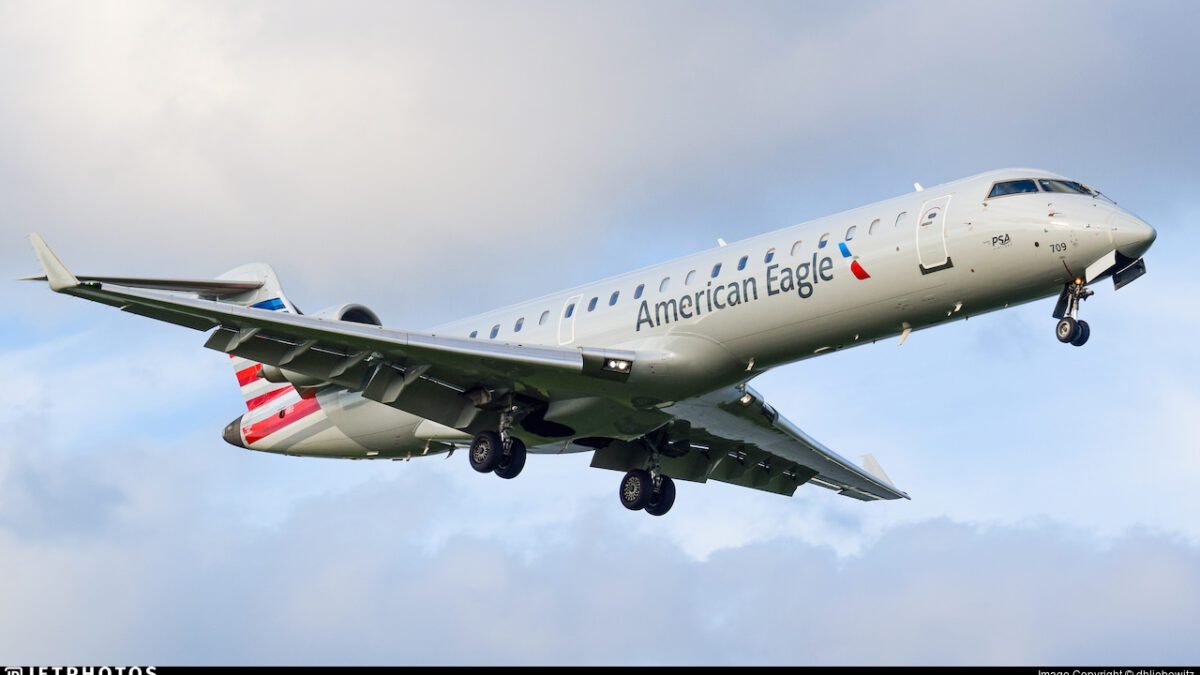 Image of CRJ700 Aircraft - "American Airlines Bombardier CRJ700 at the airport before departure.