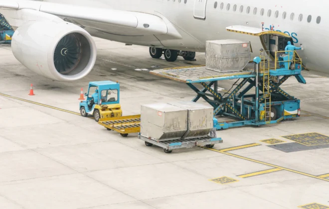 Cargo charter aircraft on the tarmac, ready for loading with goods and cargo, showcasing its spacious and versatile design for efficient freight transport.